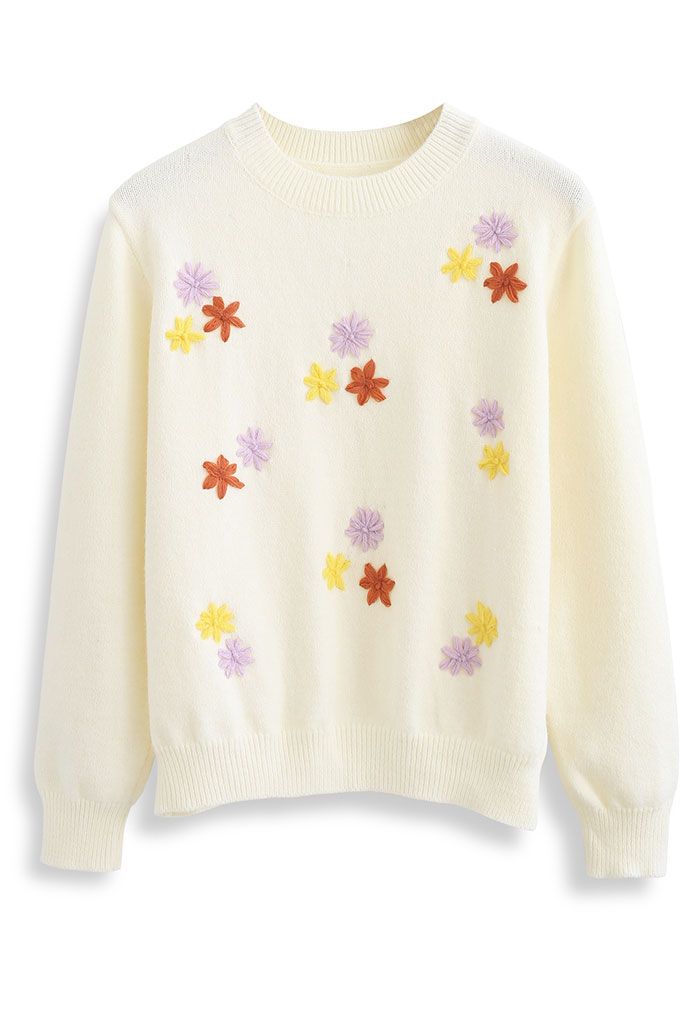 Pull en tricot doux au toucher avec fleurs cousues tombantes
