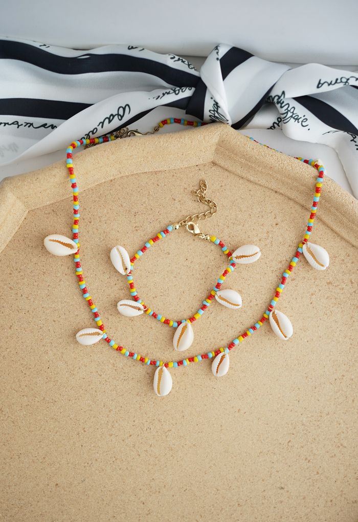 Ensemble collier et bracelet en chaîne de perles de coquillages