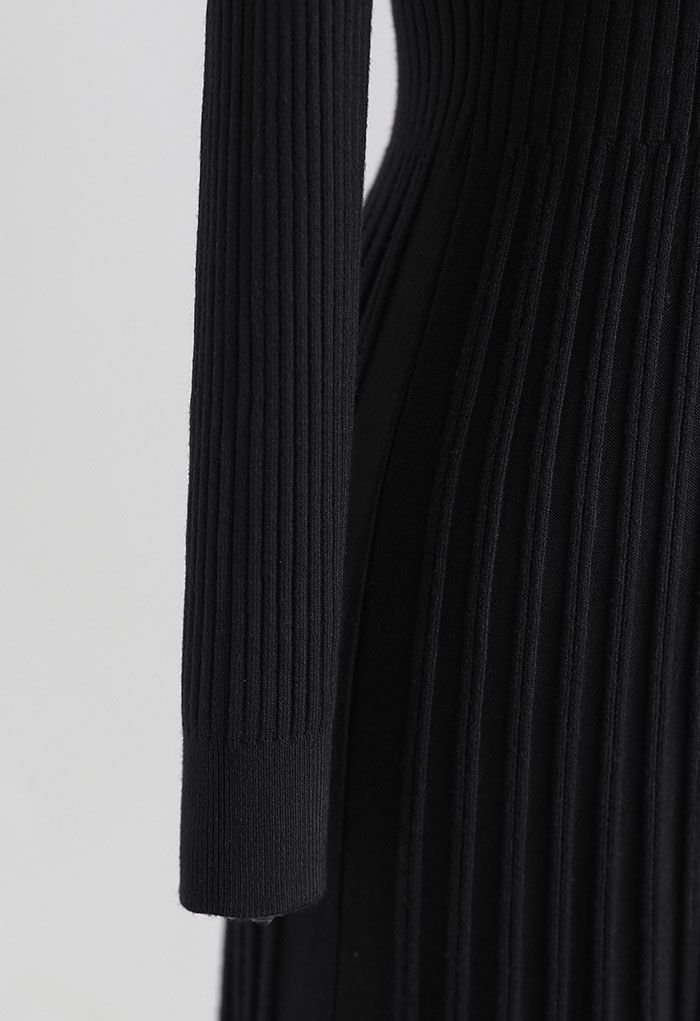 Robe mi-longue trapèze en maille côtelée boutonnée sur le devant en noir