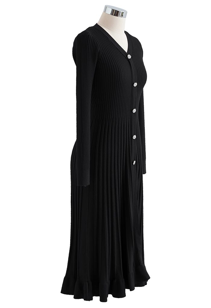Robe mi-longue trapèze en maille côtelée boutonnée sur le devant en noir