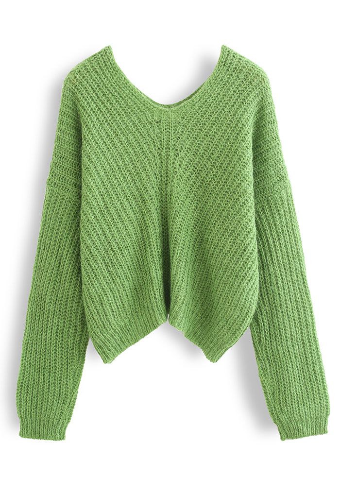 Pull en tricot évidé à col en V en vert