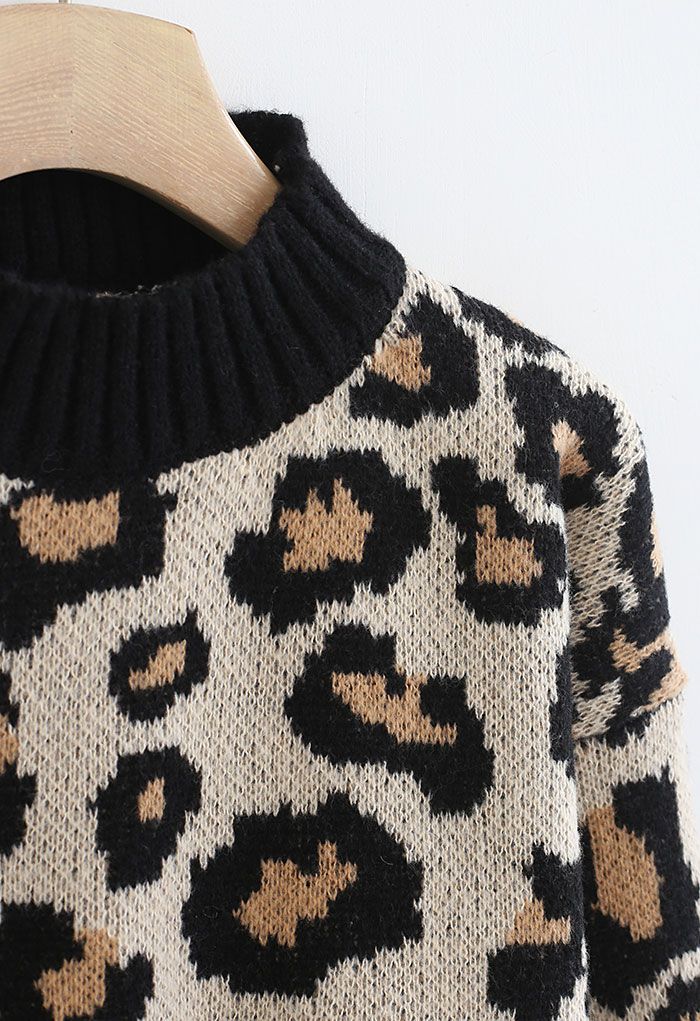 Pull en tricot à col montant et imprimé léopard sauvage