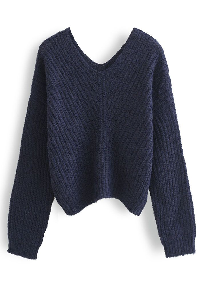 Pull en tricot évidé à col en V en bleu marine