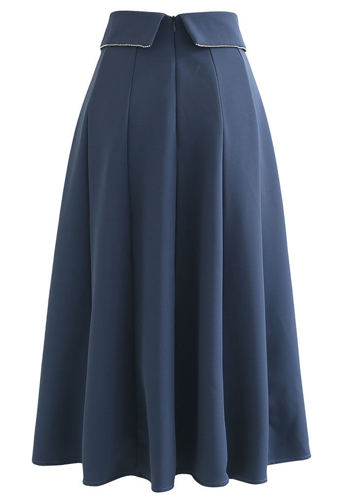 Jupe mi-longue avec coutures à rabat en cristal en bleu poussiéreux
