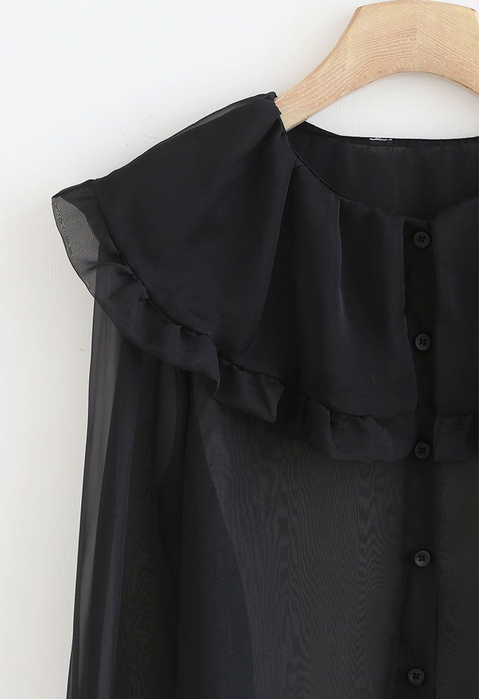 Chemise transparente à col claudine exagéré en noir