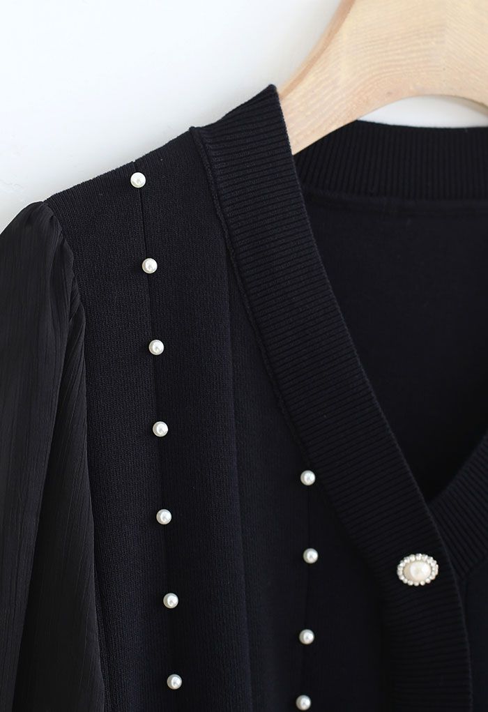 Haut en tricot boutonné nacré à manches transparentes en noir