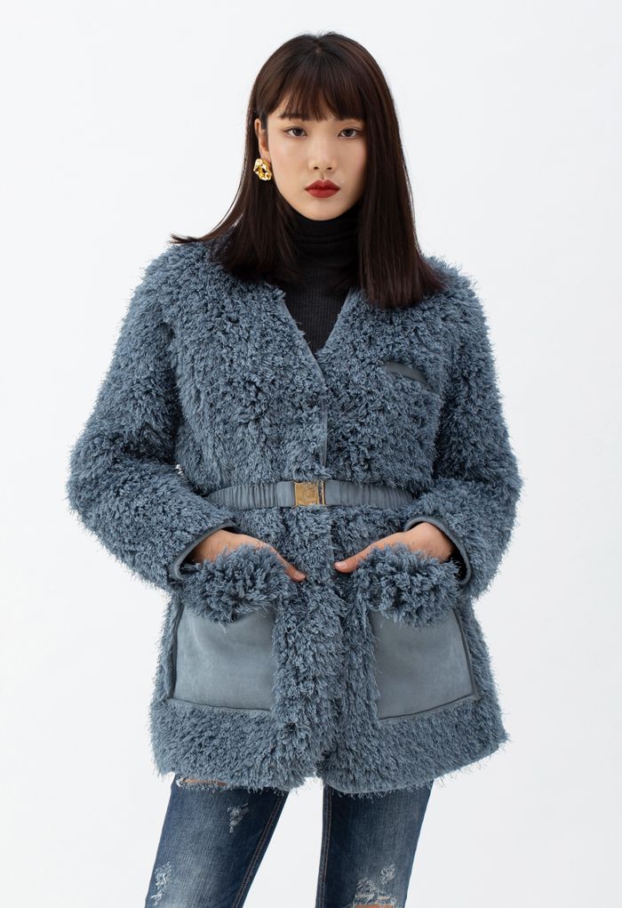 Manteau en daim pelucheux sans col en bleu sarcelle
