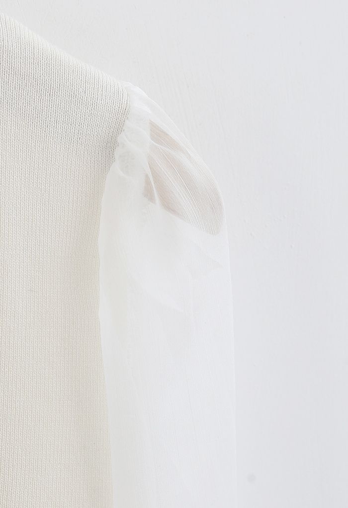Haut en tricot enveloppé à manches transparentes en blanc