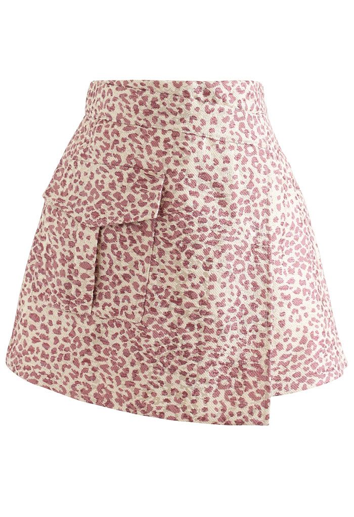 Mini-jupe asymétrique scintillante à motif léopard en rose