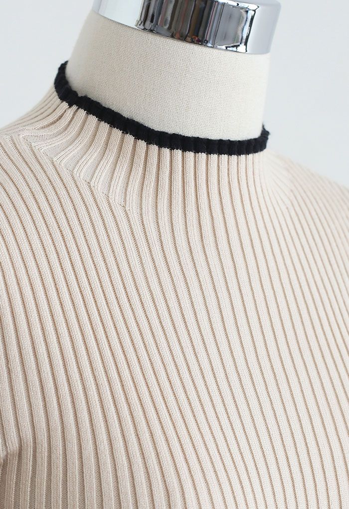 Robe en tricot avec nœud à nouer sur le devant et bord contrastant