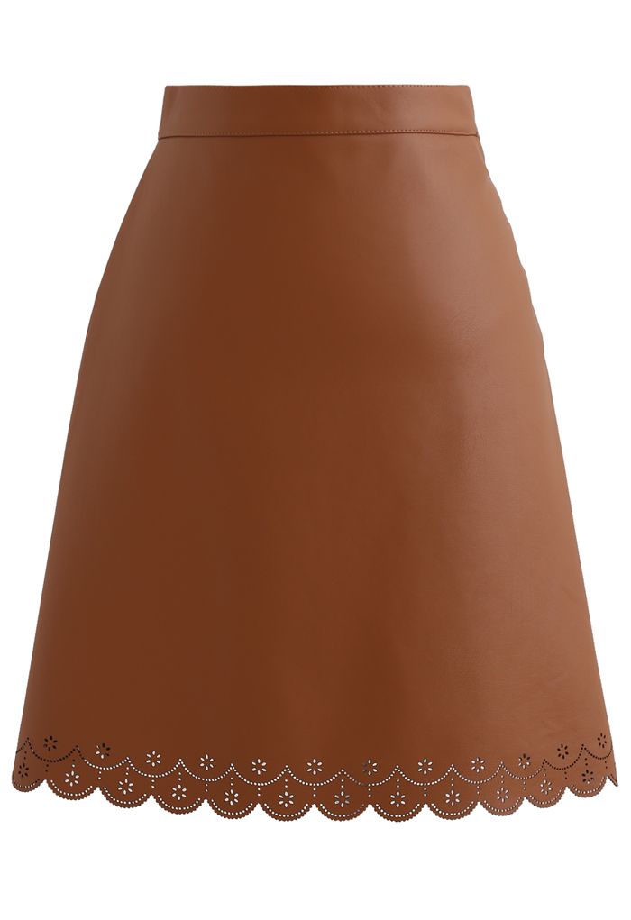 Mini-jupe en faux cuir à découpes en caramel