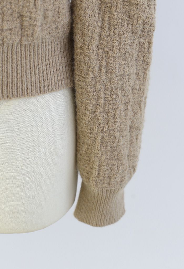 Pull en tricot texturé à épaules bouffantes en fauve