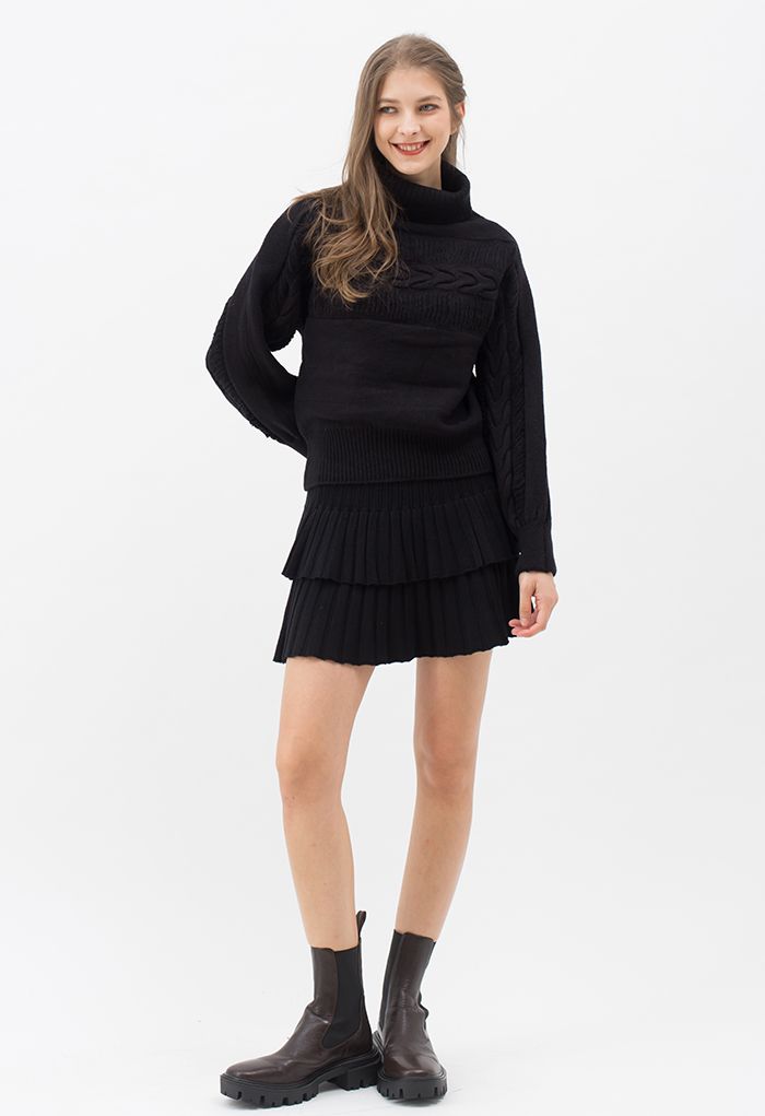 Pull en tricot à col roulé avec détails frangés en noir