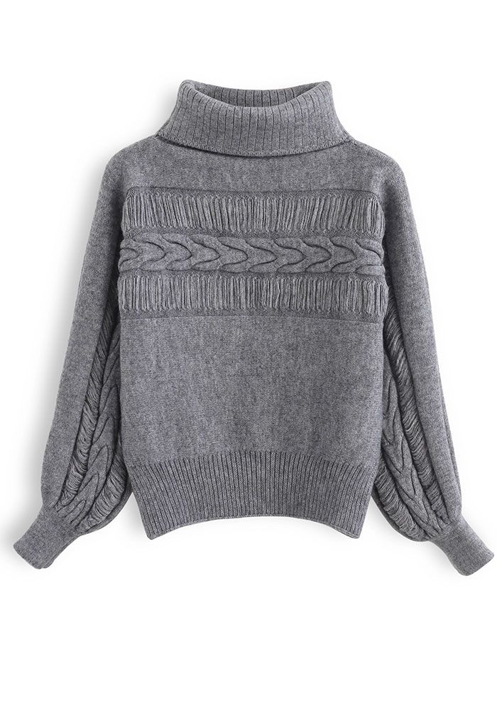 Pull en tricot à col roulé avec détails frangés en gris