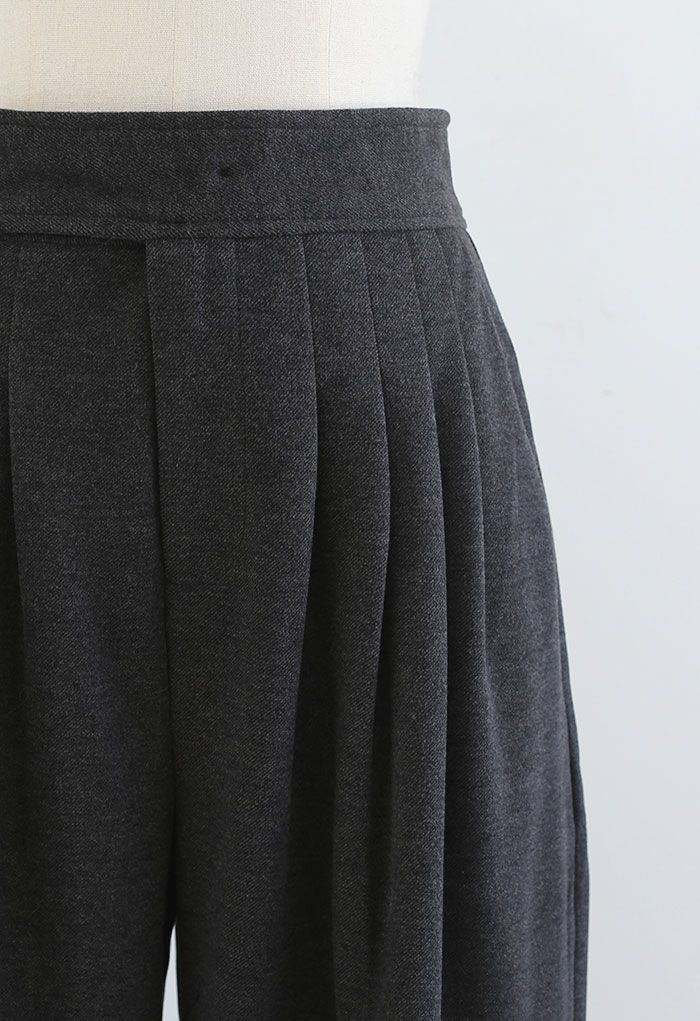 Pantalon plissé en laine mélangée à jambe large en fumée
