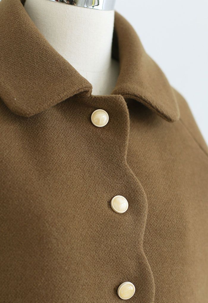Manteau long boutonné en laine mélangée à bord festonné en olive