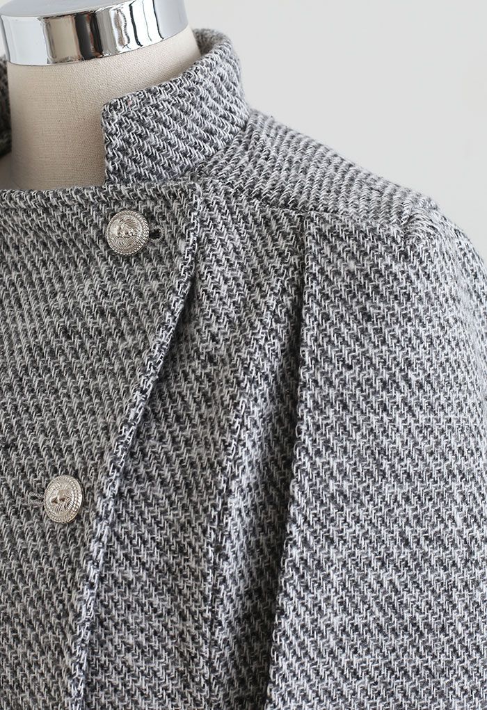Manteau cape en tweed à double boutonnage avec poche à rabat