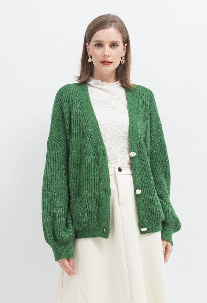 Cardigan boutonné en tricot chatoyant avec poche plaquée en vert