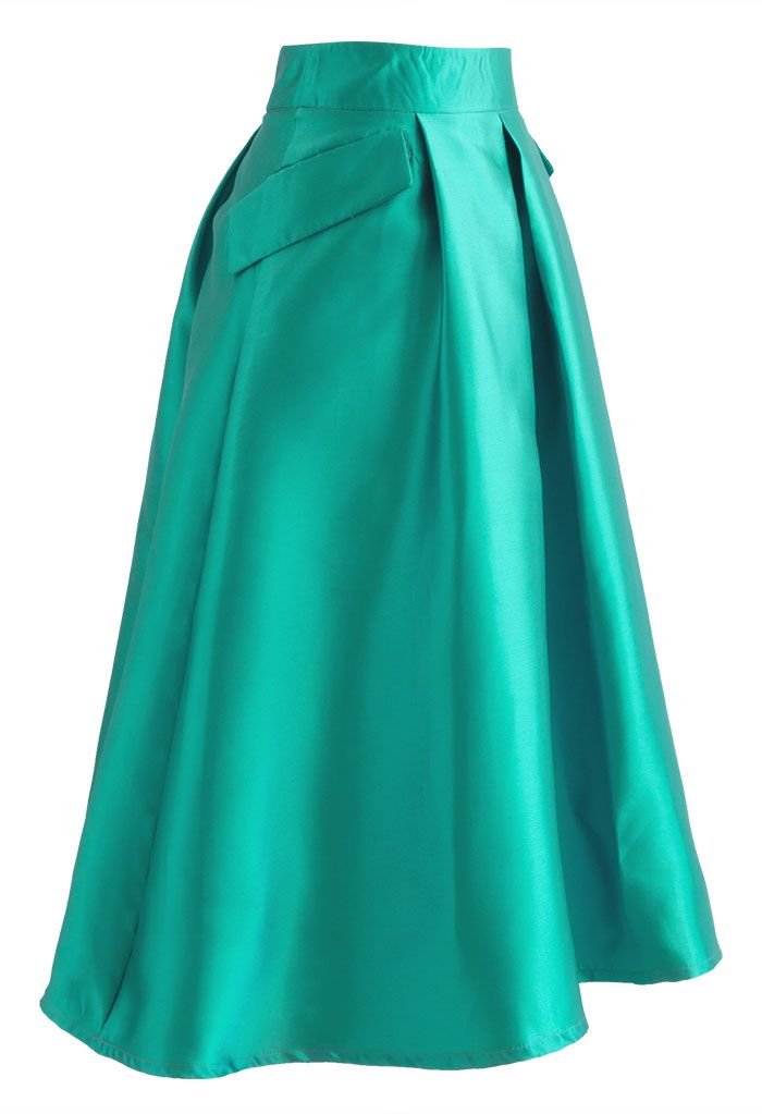Jupe plissée trapèze avec poches exagérées en turquoise