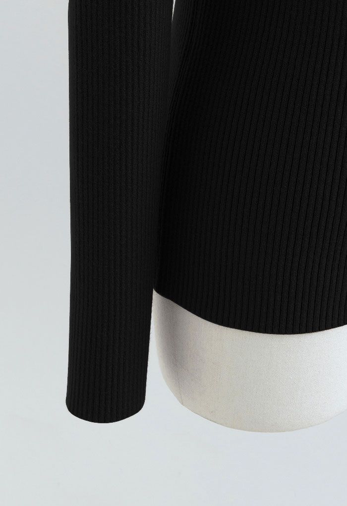 Haut en tricot côtelé à col roulé et manches longues en noir