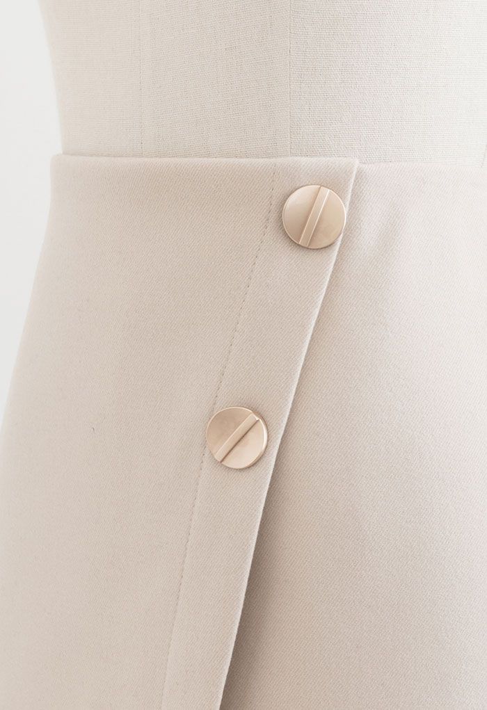Mini-jupe en mélange de laine à double boutonnage en ivoire