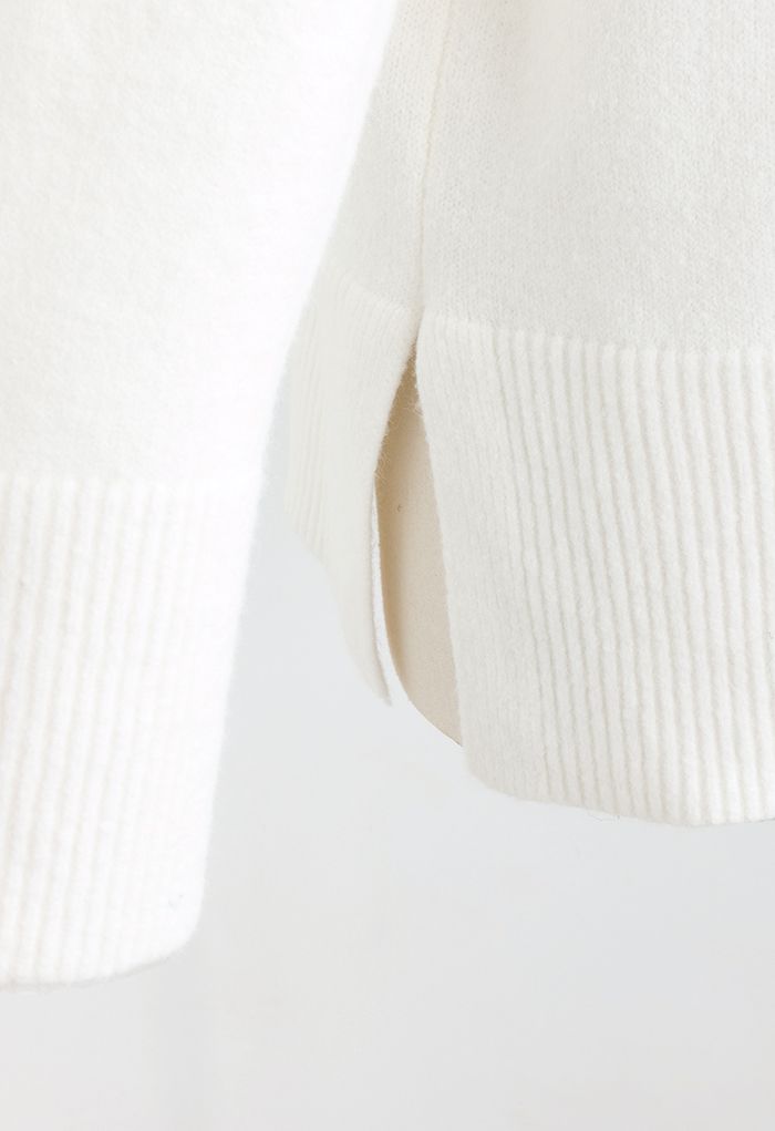 Pull en tricot à col roulé et ourlet fendu en blanc