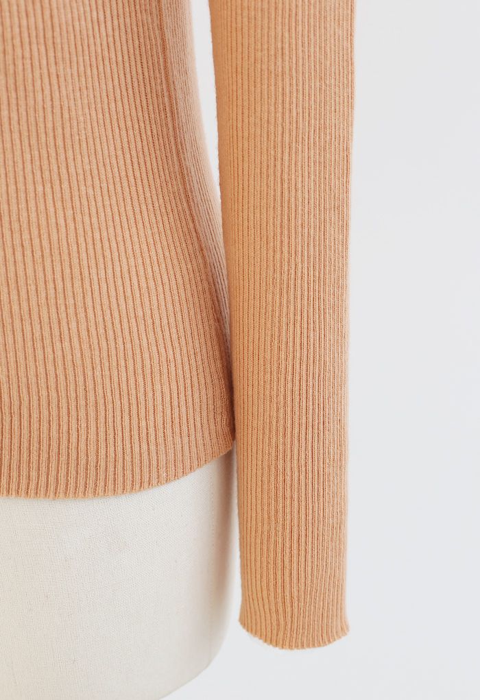Haut en tricot côtelé ajusté à col roulé en abricot