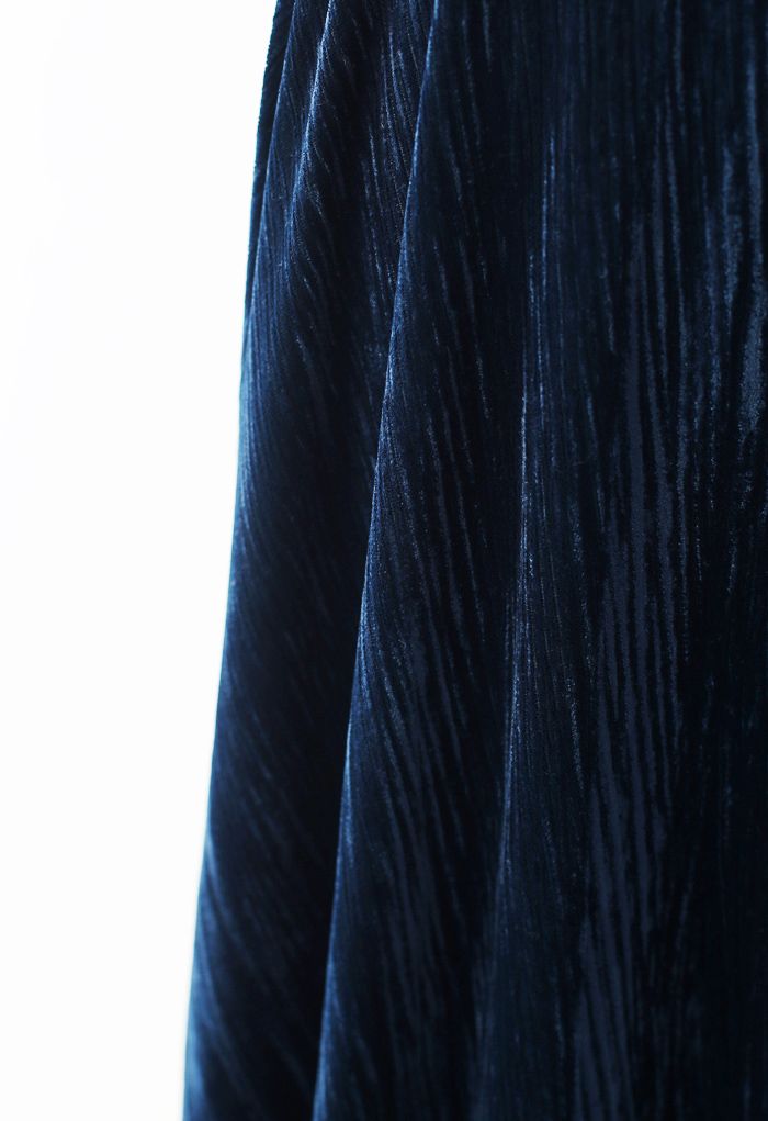 Jupe mi-longue en velours à ourlet évasé en bleu marine