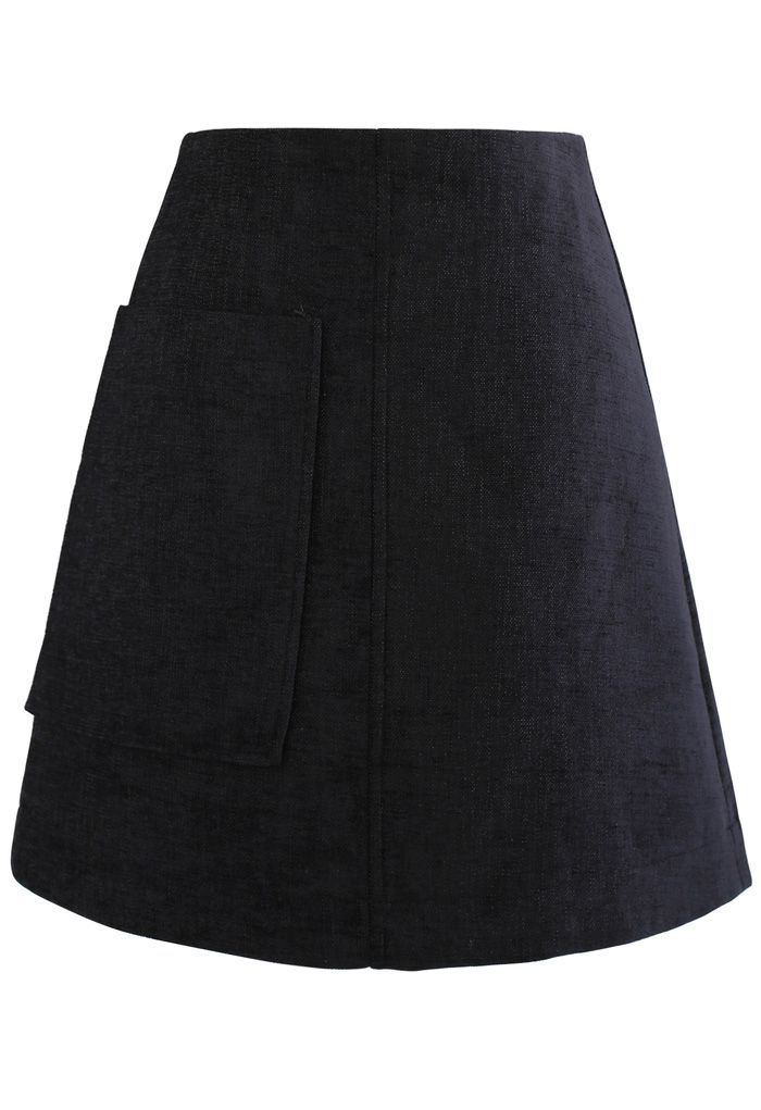 Mini-jupe en tweed scintillant avec poche plaquée en noir