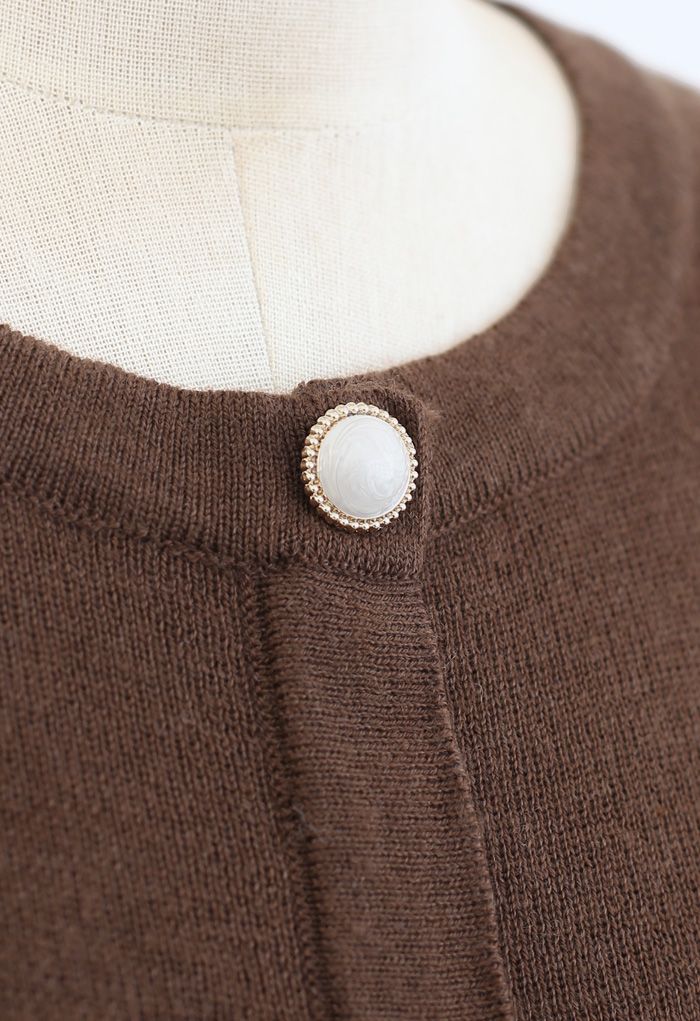 Haut boutonné en tricot côtelé à manches bouffantes en marron