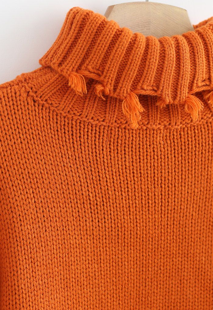 Pull court en tricot à col roulé et manches zippées en orange
