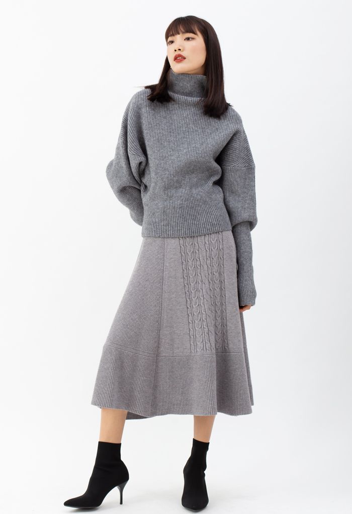 Jupe mi-longue trapèze en tricot doux à texture tressée en gris