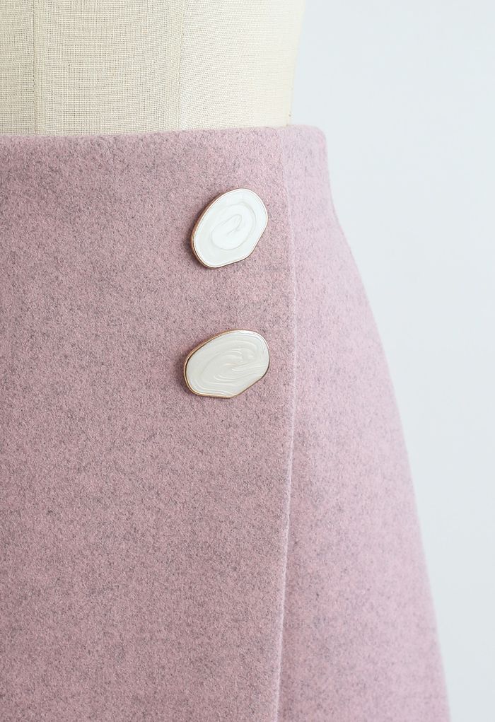Mini-jupe marbrée à rabat boutonné en rose