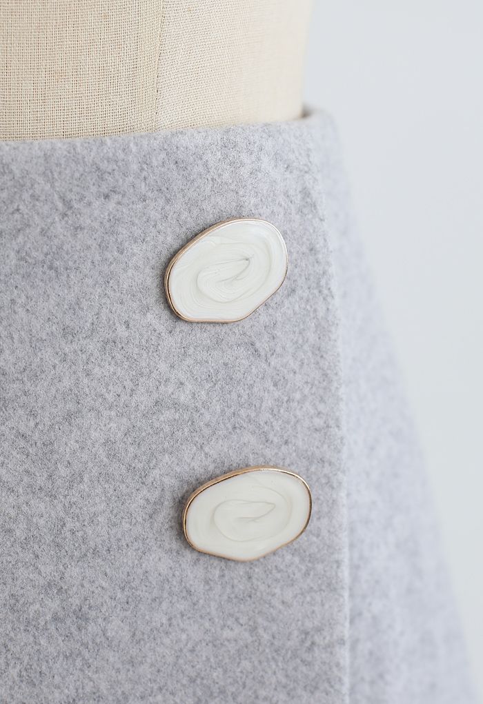 Mini-jupe à rabat boutonné marbré en gris