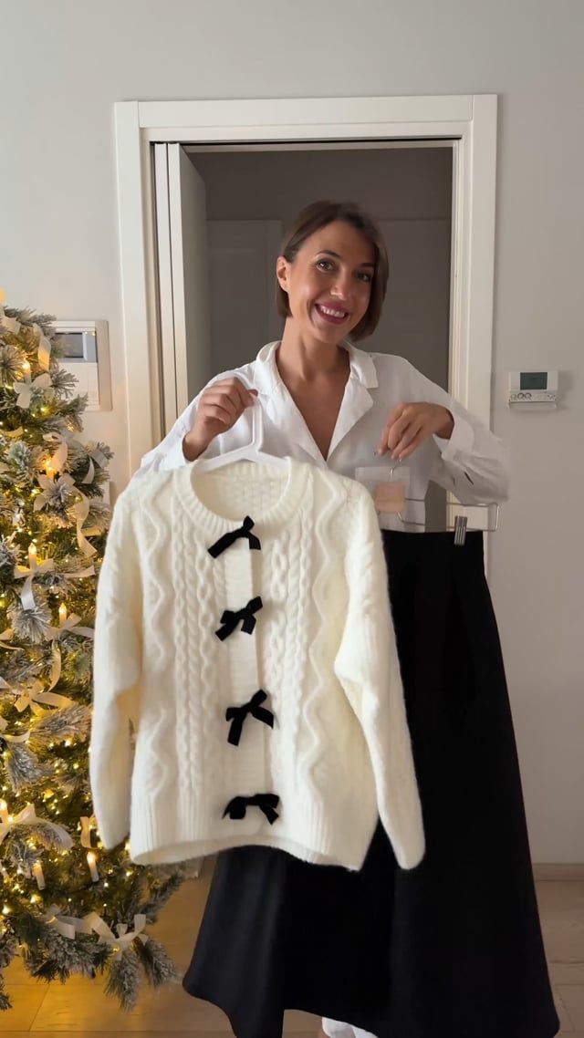 Cardigan en tricot tressé avec boutons-pression et nœud papillon en blanc