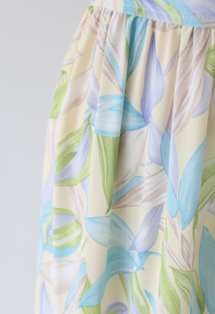 Robe longue cache-cœur multicolore à imprimé feuilles et ourlet à volants
