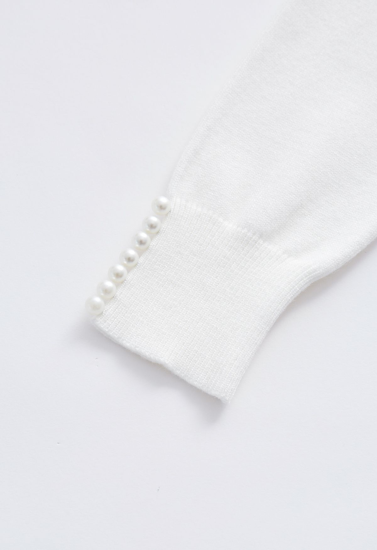 Haut en tricot doux bordé de perles en blanc