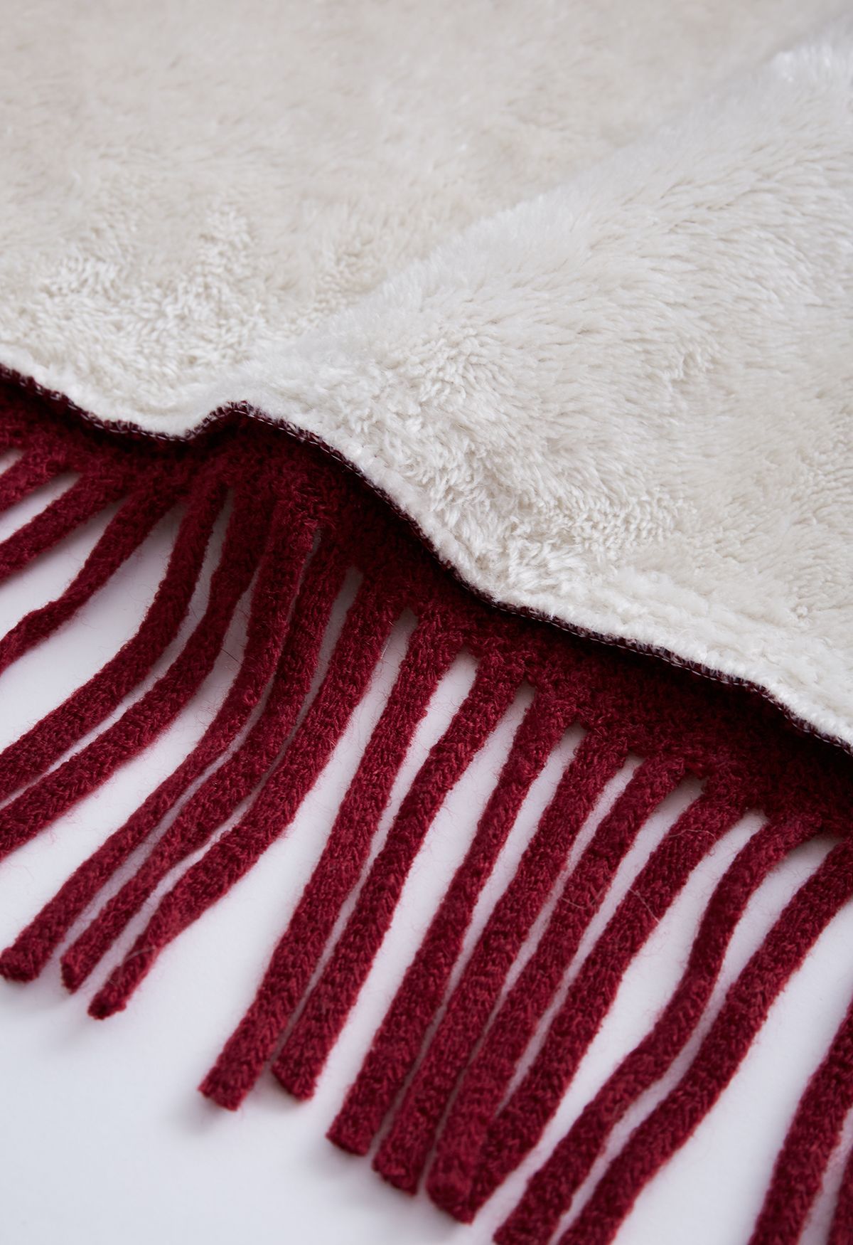 Poncho à capuche en fausse fourrure à franges en laine mélangée flocon de neige