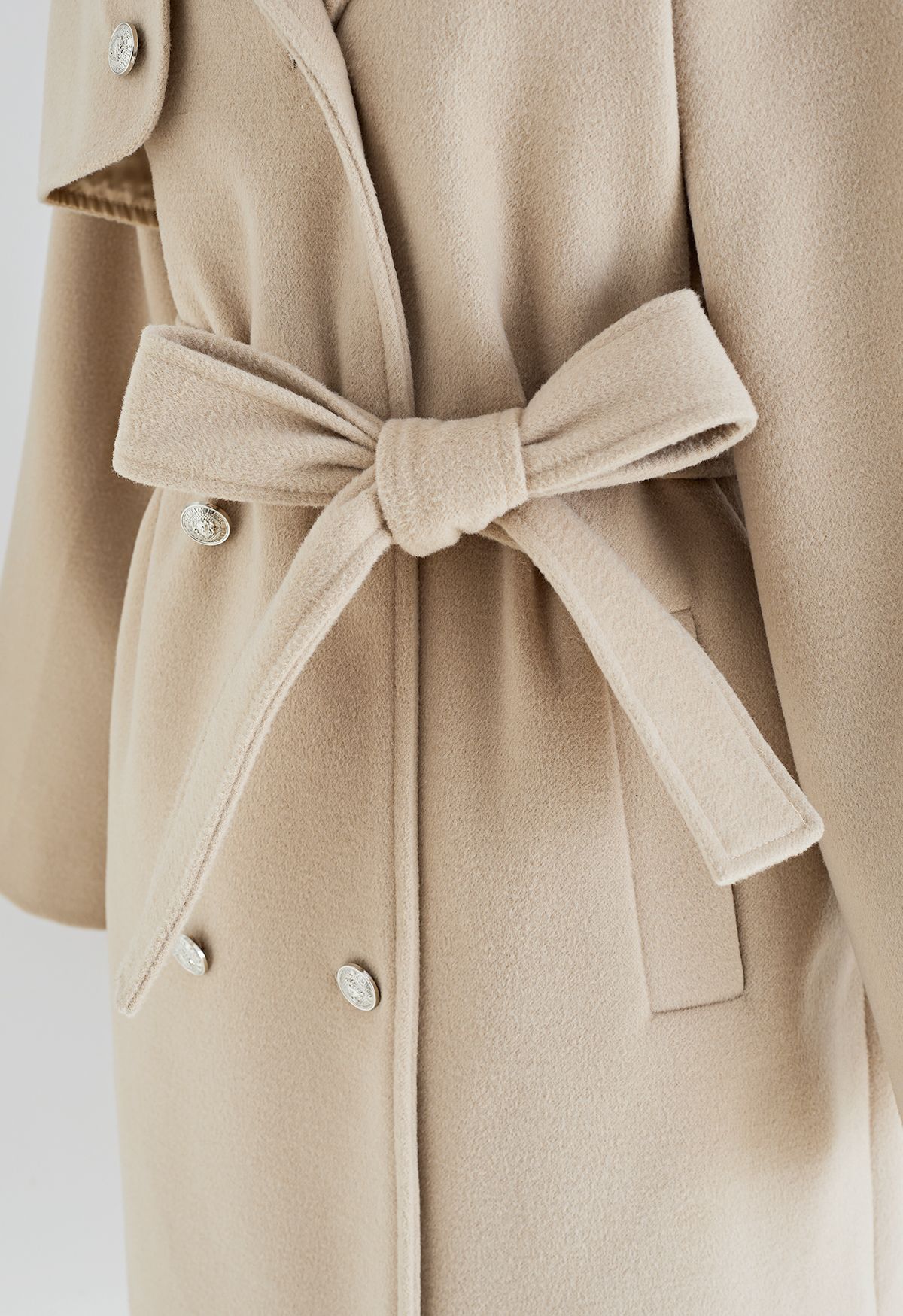 Manteau ceinturé à col en fausse fourrure et double boutonnage en flocons d'avoine