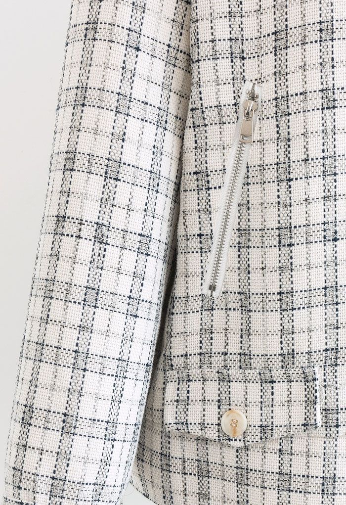 Blazer zippé en tweed à carreaux en blanc