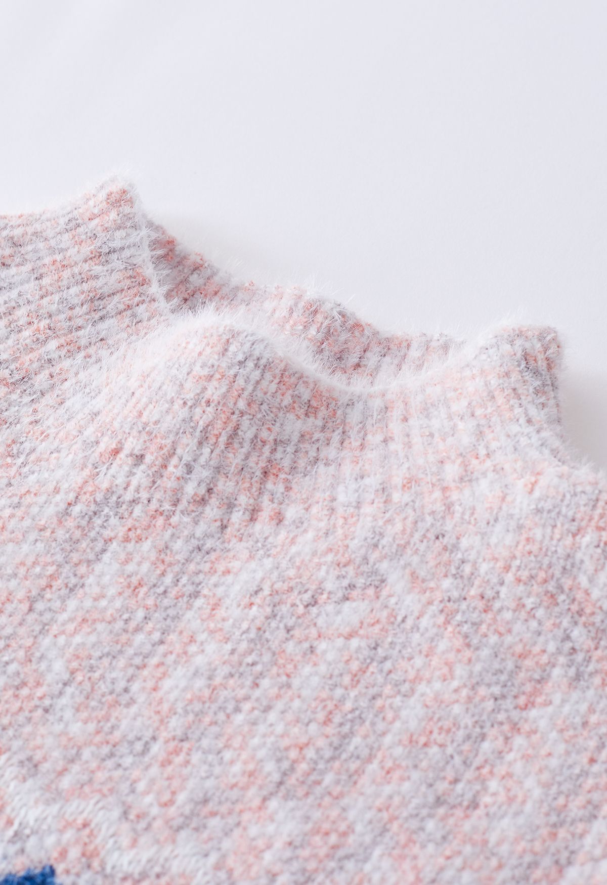 Pull en tricot chiné à motif de flocons de neige flous