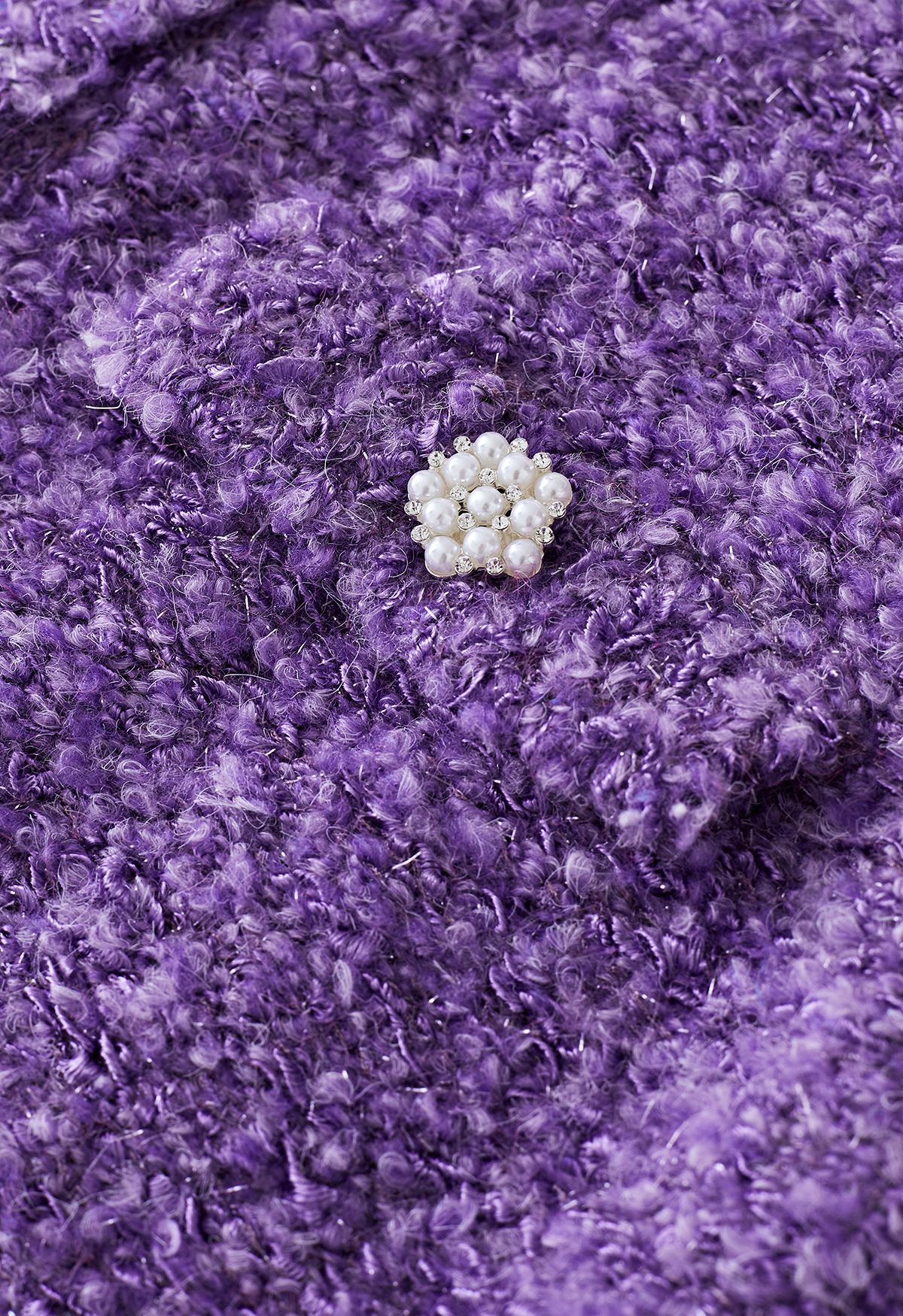 Cardigan court flou scintillant à boutons nacrés en violet