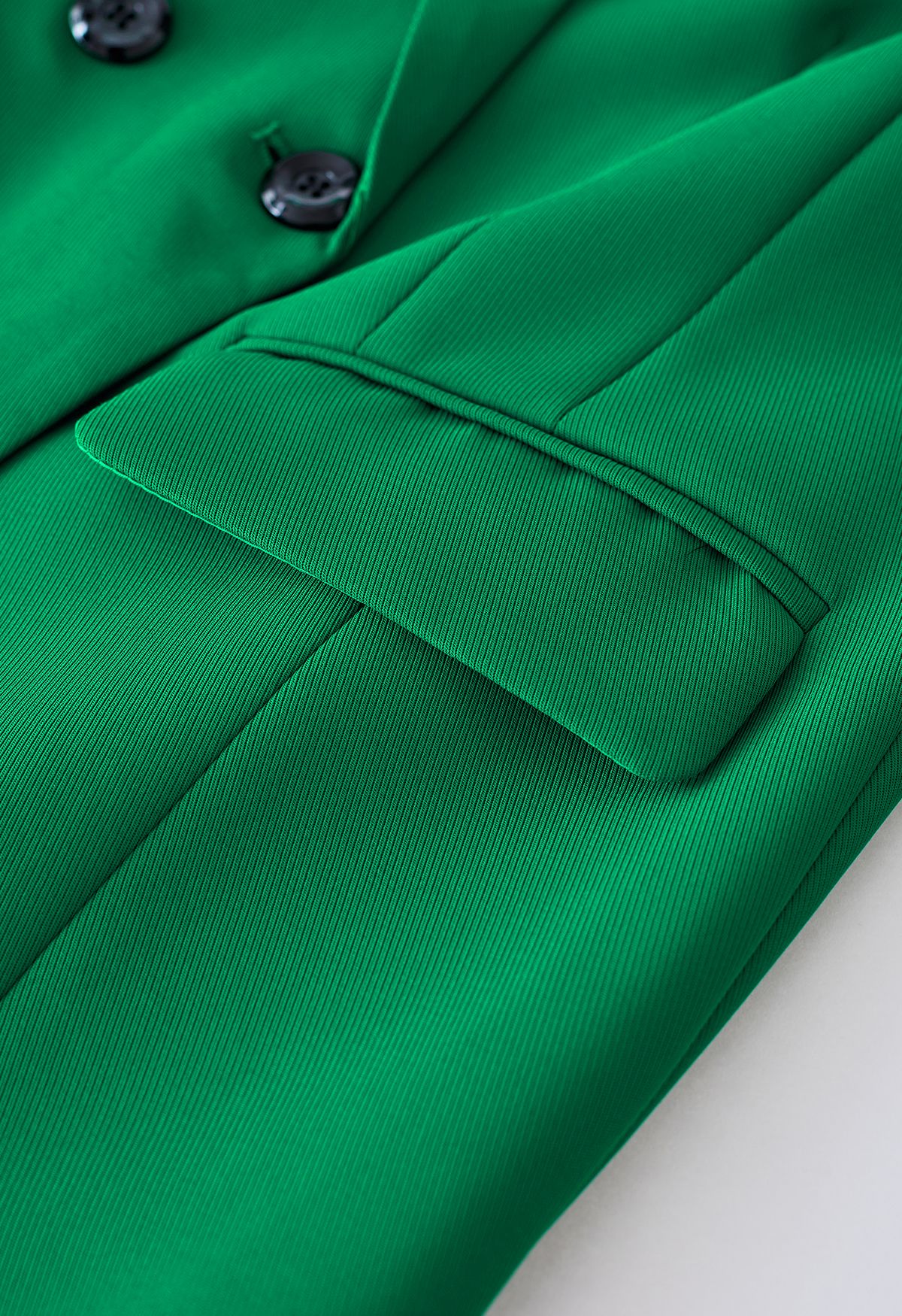Ensemble blazer et jupe de couleur unie avec insigne d'abeille en vert