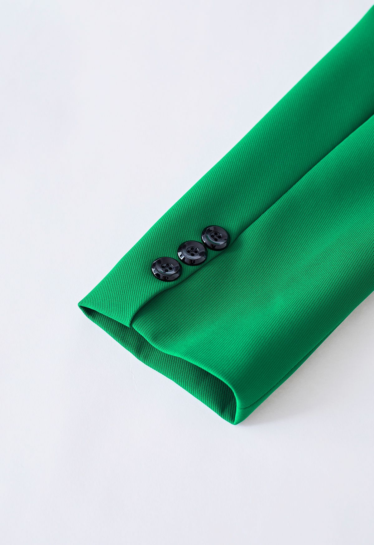 Ensemble blazer et jupe de couleur unie avec insigne d'abeille en vert