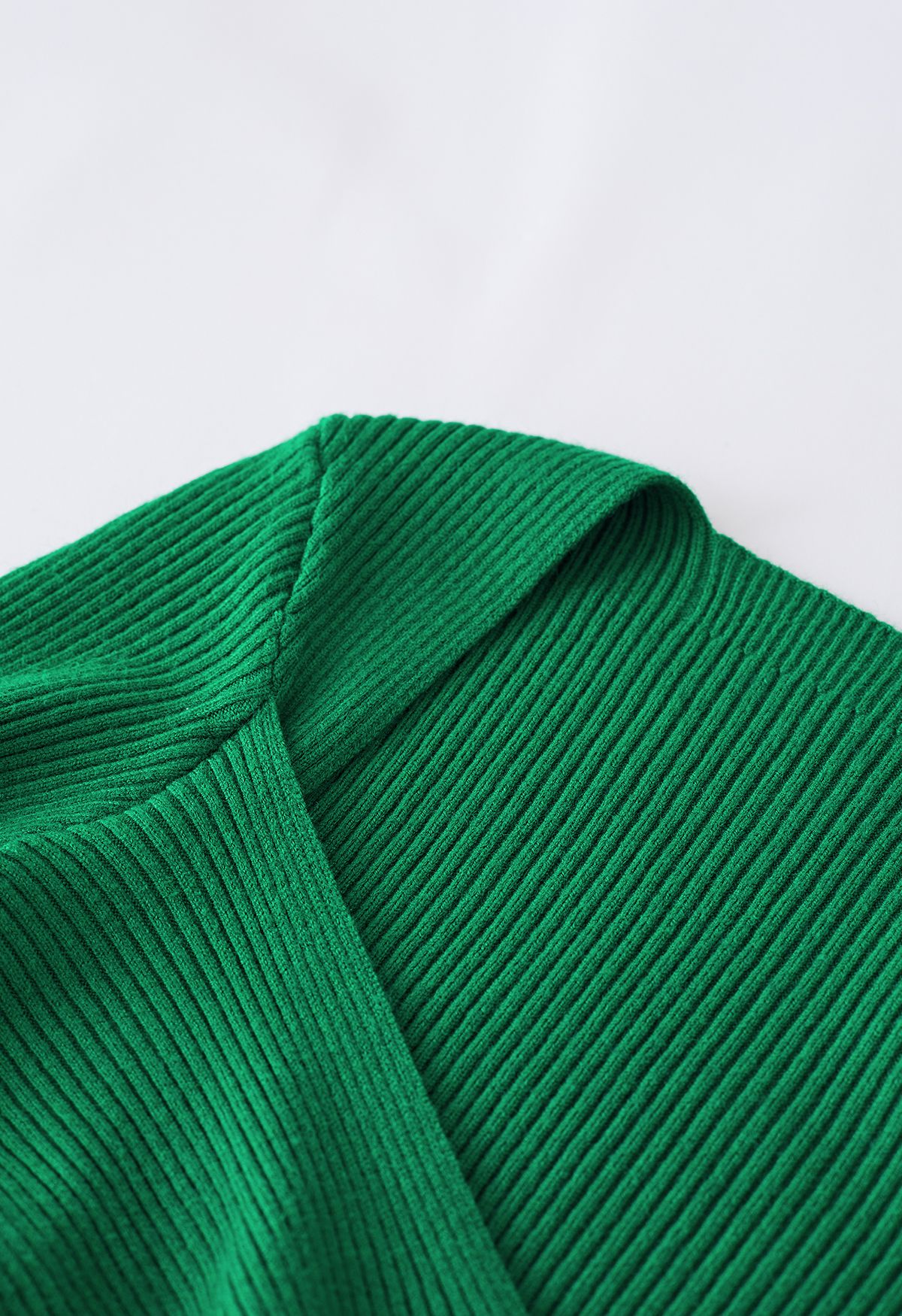 Haut en tricot côtelé torsadé sur le devant en vert