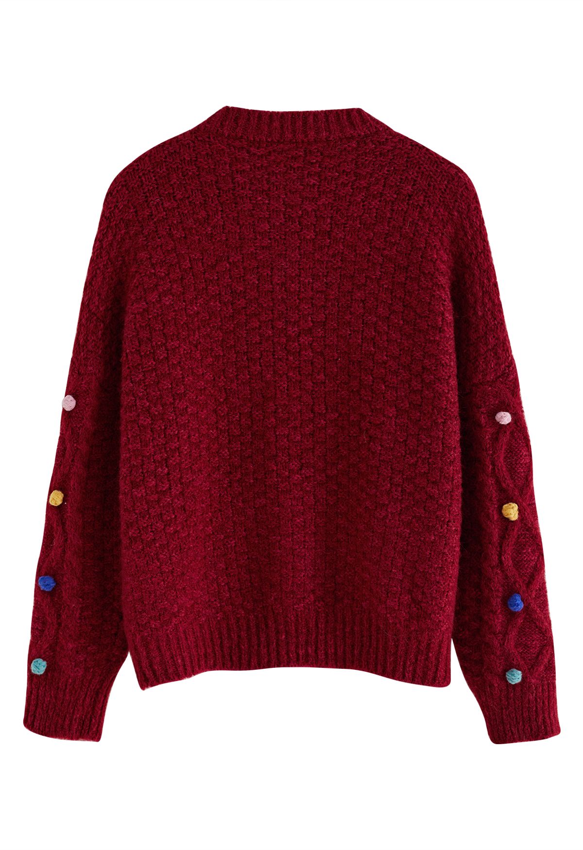 Cardigan coloré en tricot à losanges et pompons en rouge
