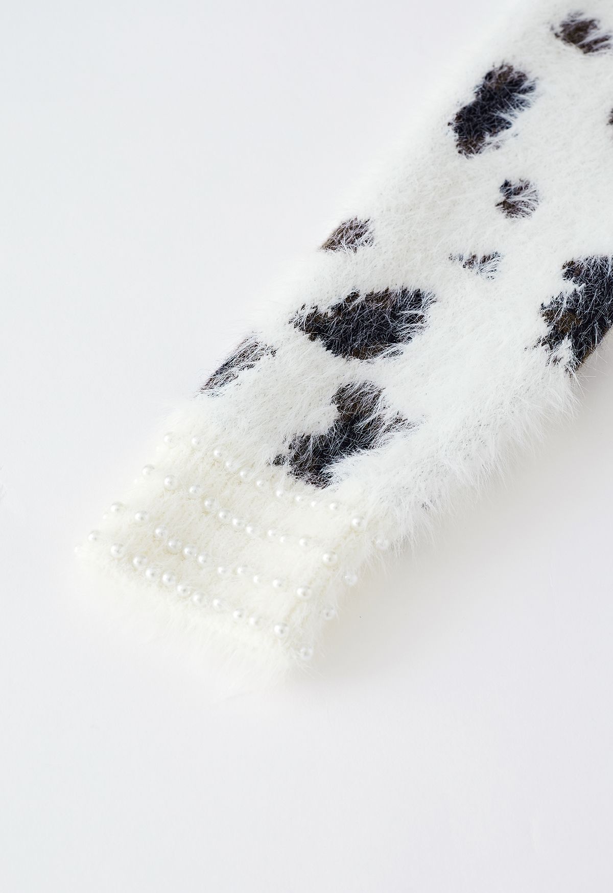 Pull court en tricot flou léopard nacré en blanc
