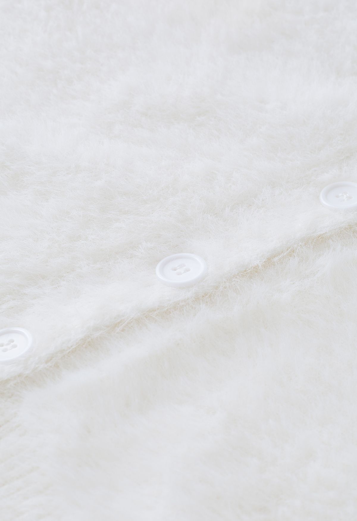 Gilet boutonné Fuzzy Soft Touch en blanc