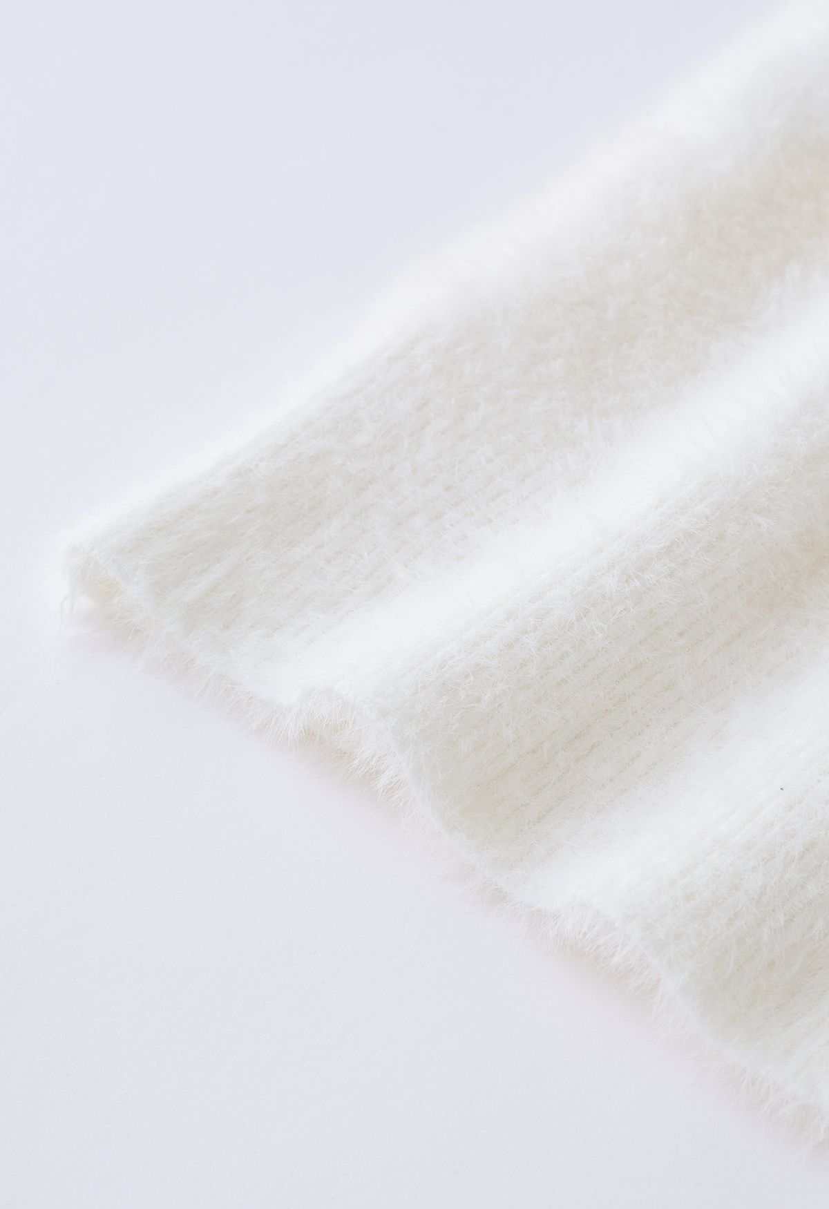 Gilet boutonné Fuzzy Soft Touch en blanc