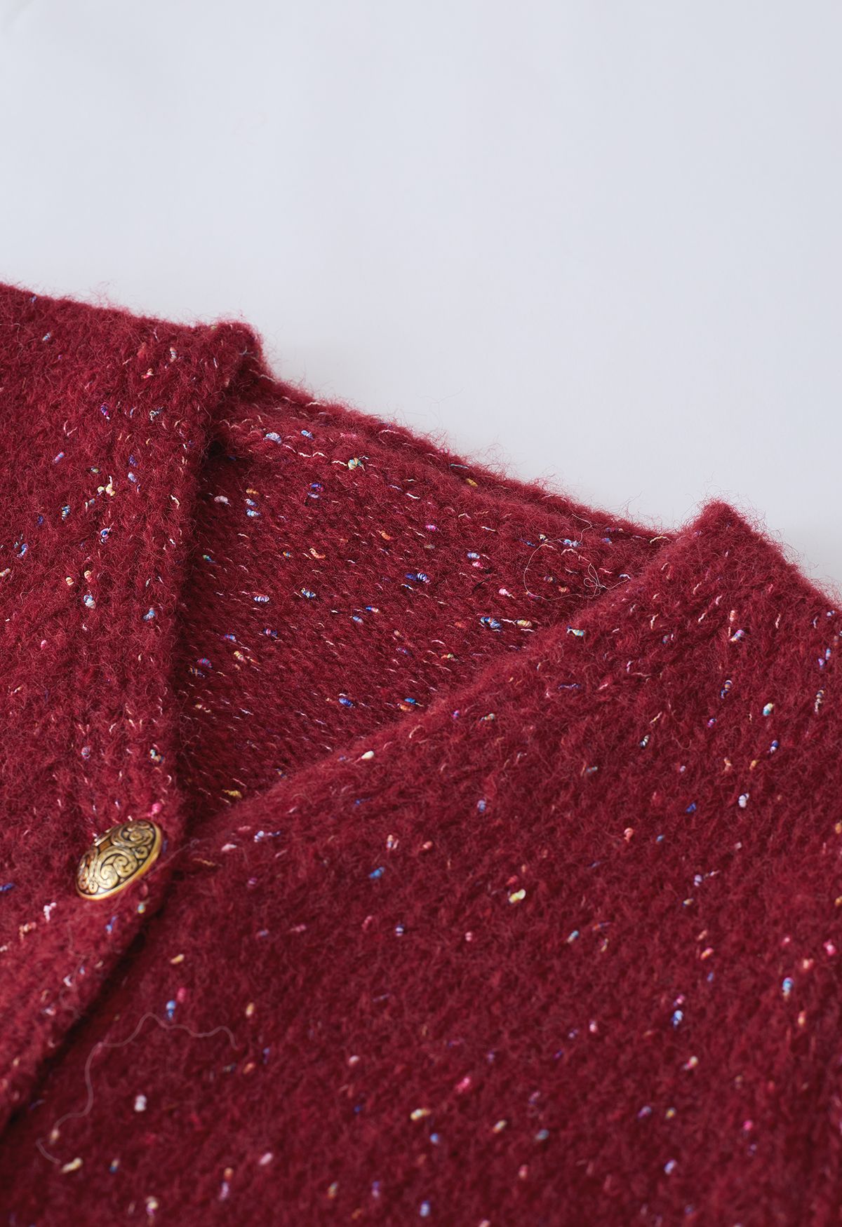 Cardigan en tricot de confettis boutonné doré en rouge